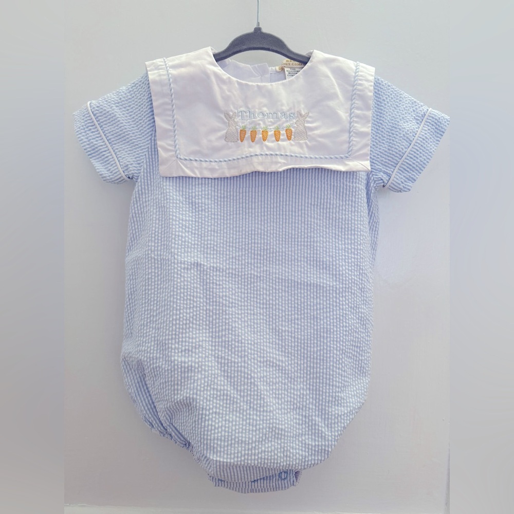TBBC blue seersucker bubble with Thomas embroidered on front. Size 2T